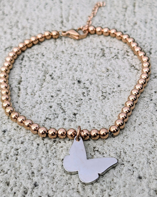 Stainless steel bracelet with butterfly charm rose gold plated