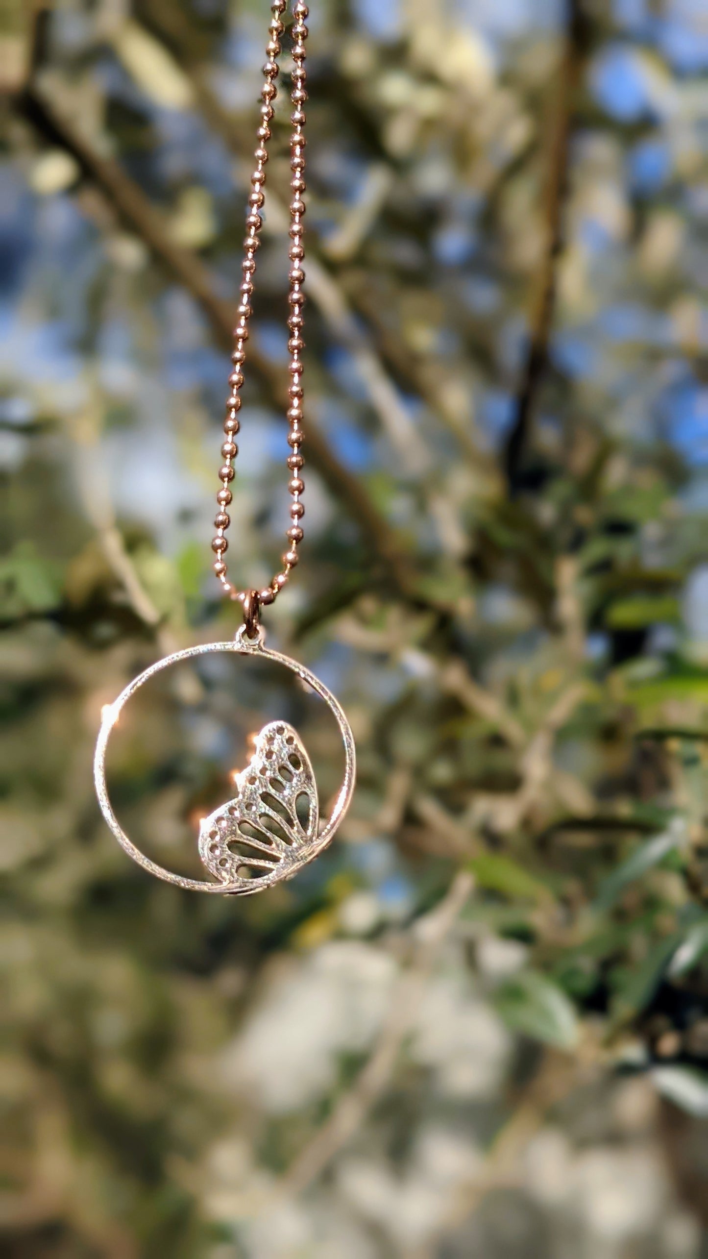 Stainless steel butterfly wing charm necklace rose gold