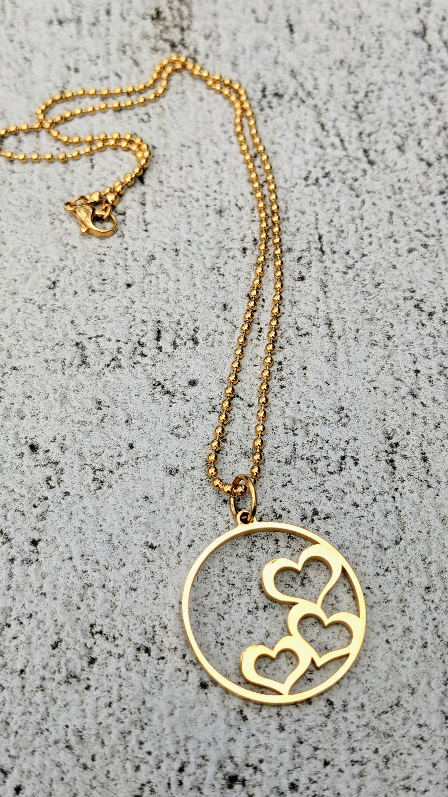 Stainless steel stacked hearts charm necklace gold