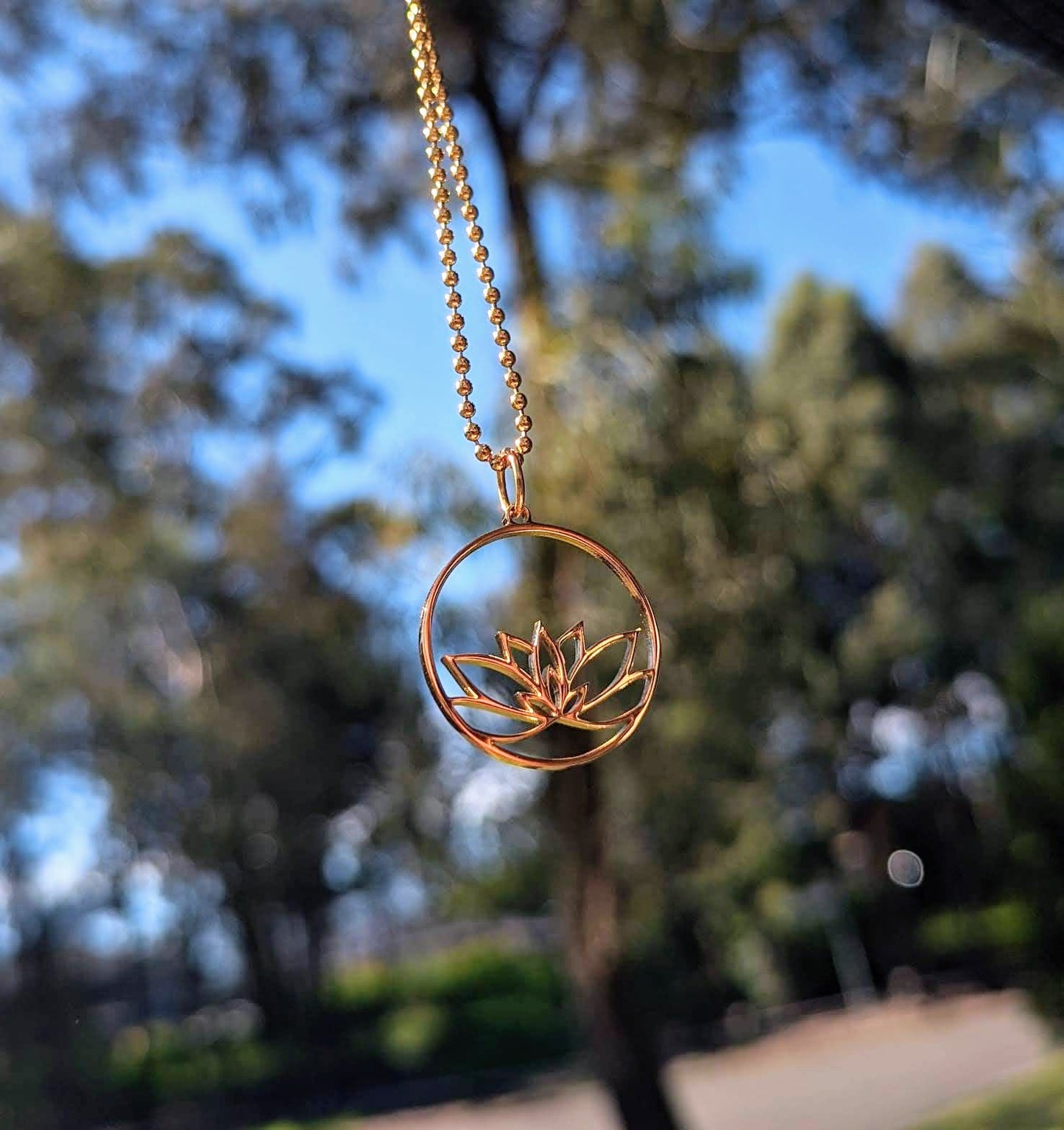 Stainless steel lotus charm necklace gold
