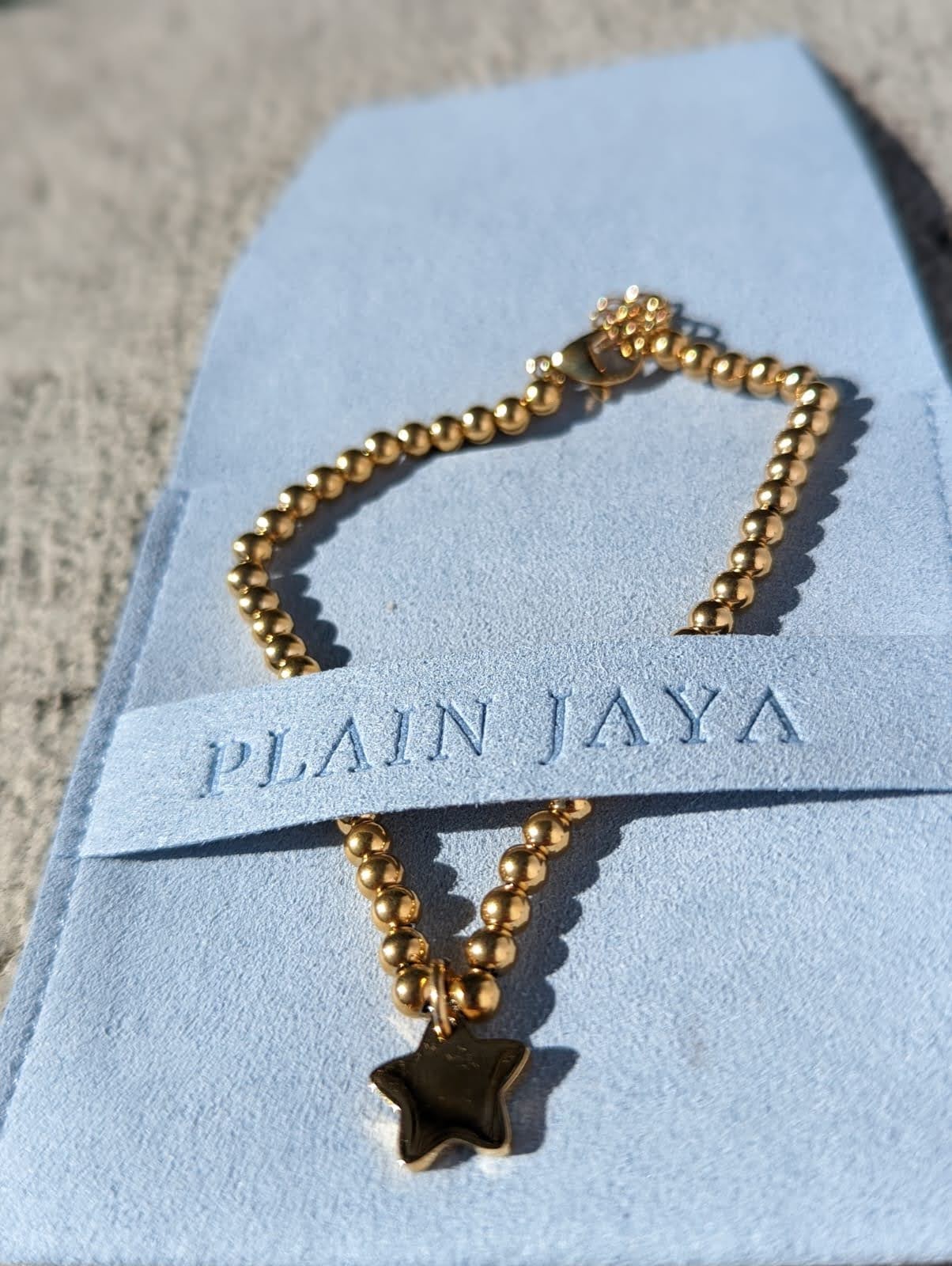 Stainless steel bead bracelet with star charm gold plated